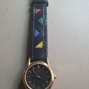 Casio Women's Watch with Black and Gold Accents